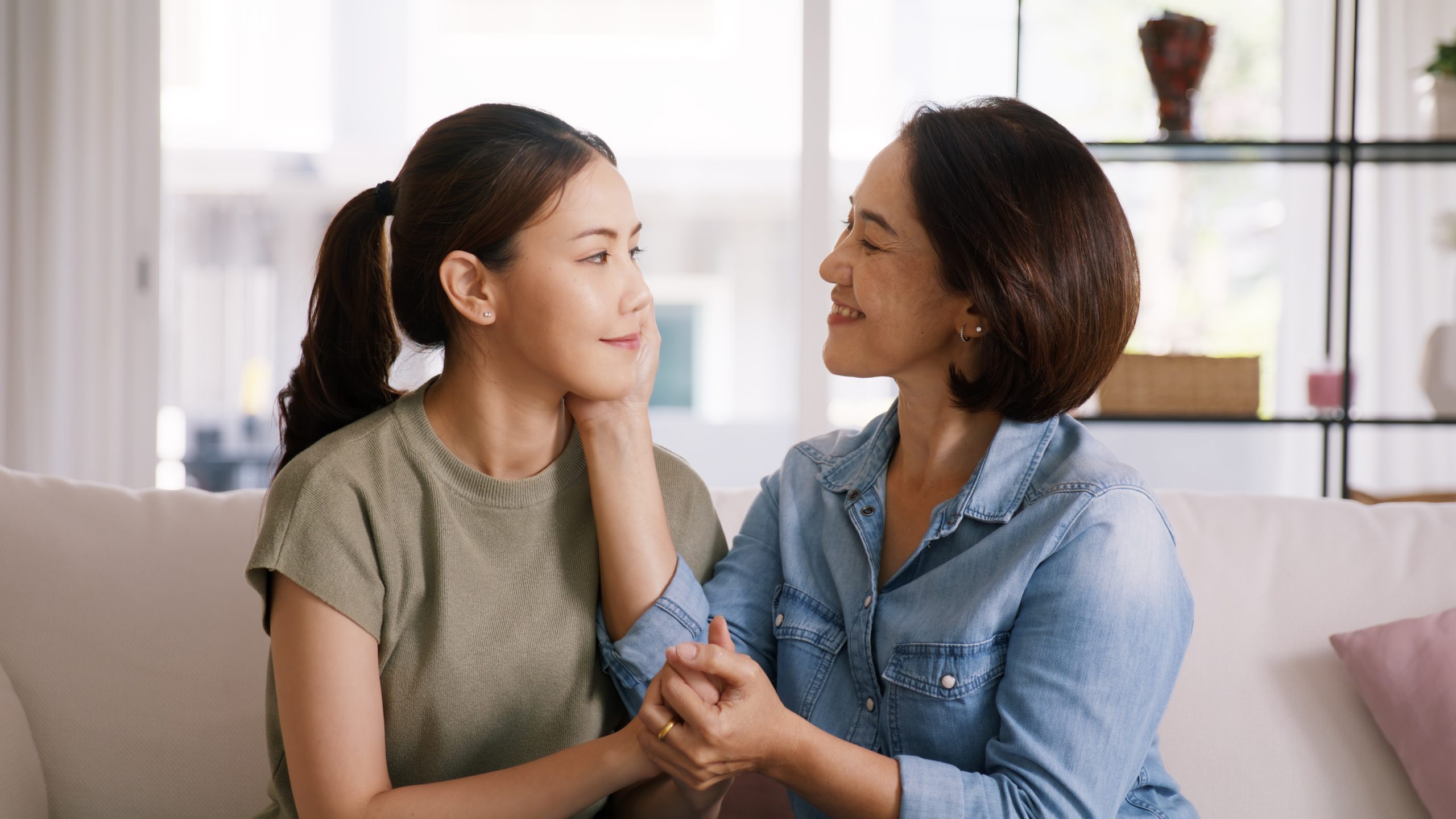 mother and daughter showing affection